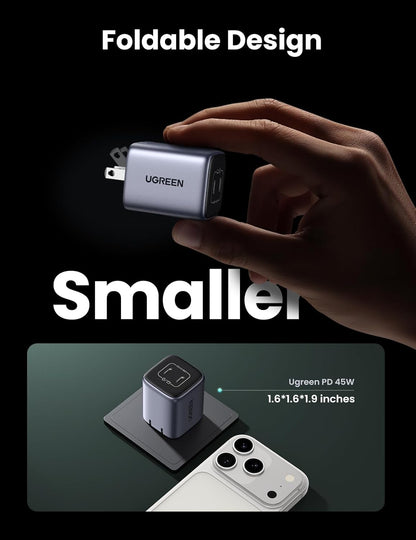 UGREEN power adapter with foldable design held by a hand, on a dark background. for sale in barbados by ZULVIRE power labs 